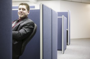 Happy Office Worker in Cubicle