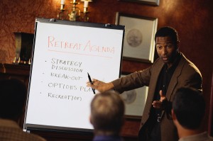 Businessman Explaining Retreat Agenda